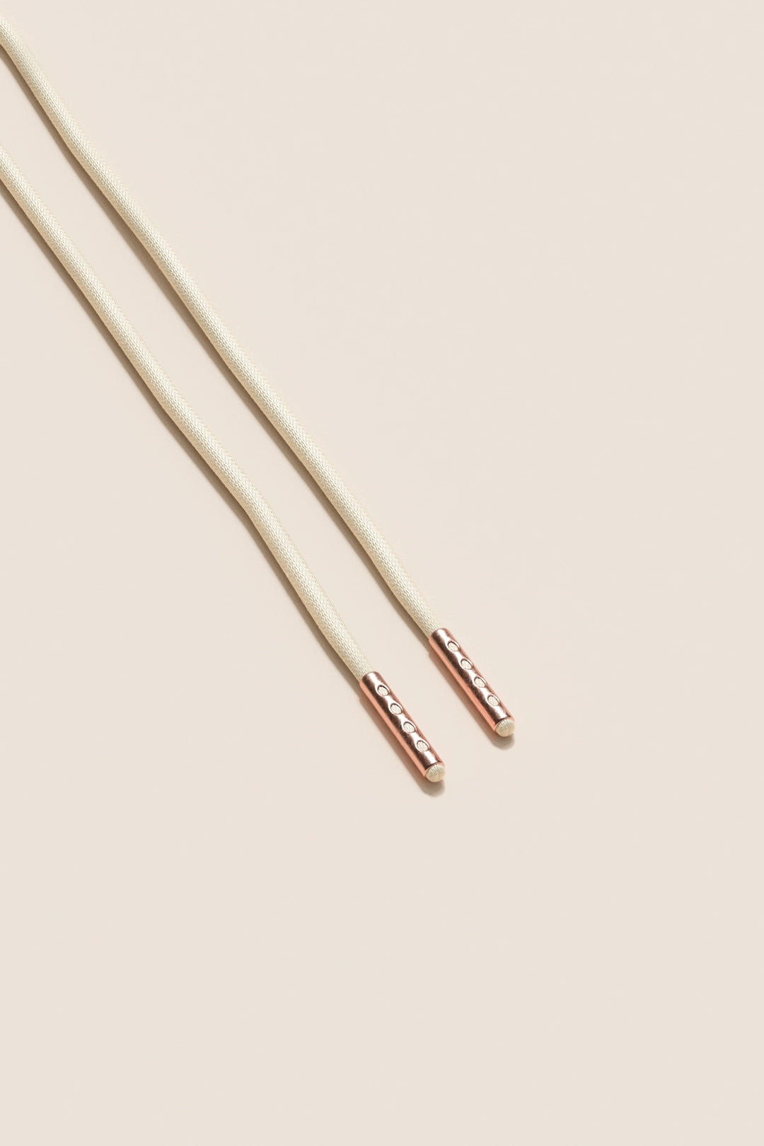 Senkels Cream 2.5mm Round Waxed Shoelaces with Rose Gold Aglets