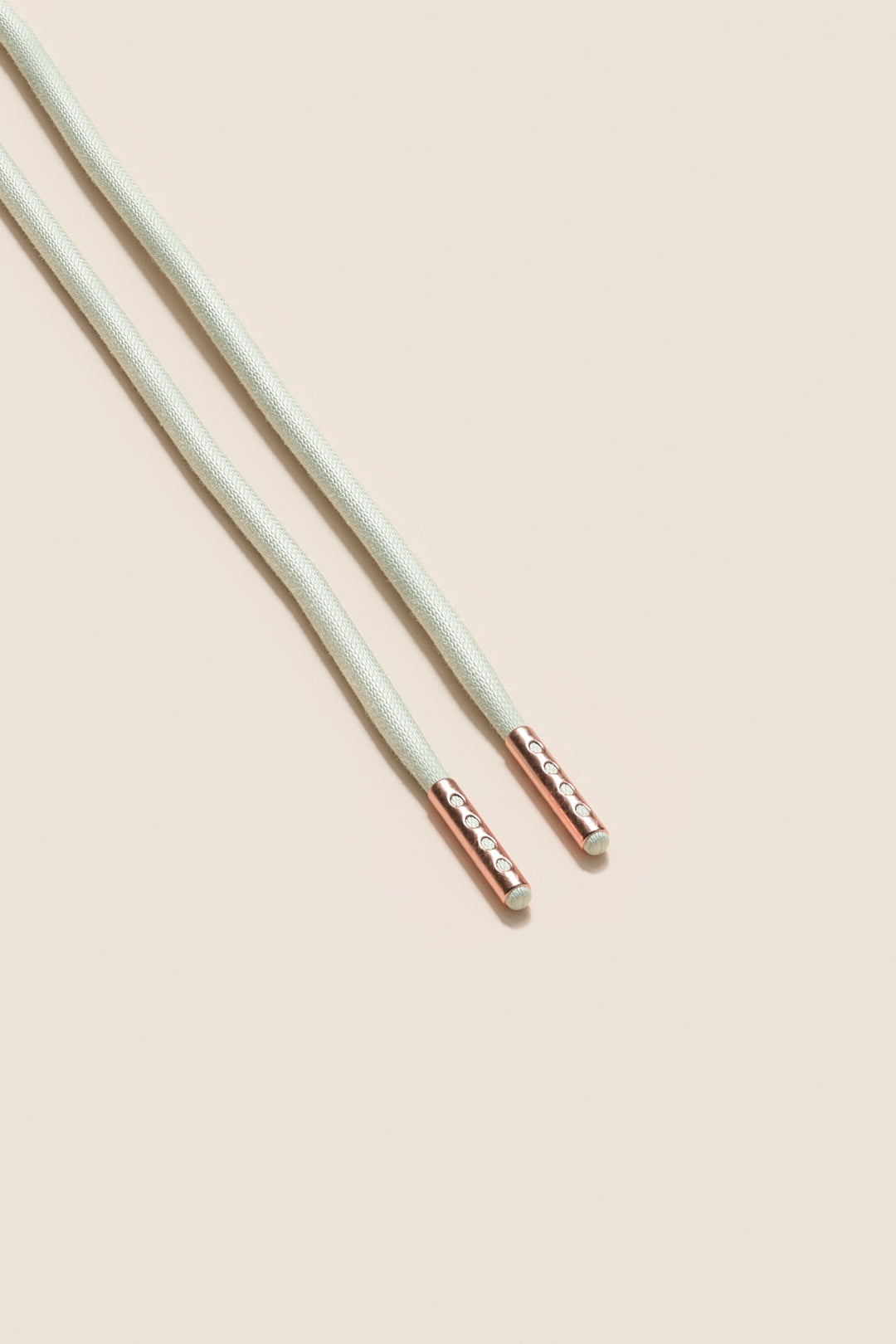 Senkels Off White 4mm Round Waxed Shoelaces with Rose Gold Aglets